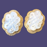 24K gold with silver and mother of pearl and diamonds