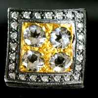 Square white topaz cufflinks set in gold and surrounded by diamonds and silver