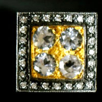 Square white topaz cufflinks set in gold and surrounded by diamonds and silver