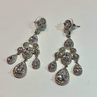 Rhodium Plated Chandelier Earrings with Dangling Oval and Pear Shaped CZs
