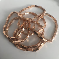 Cluster of Rose Gold Plated Stretch Bracelets